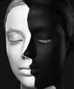 A white and black painted face.